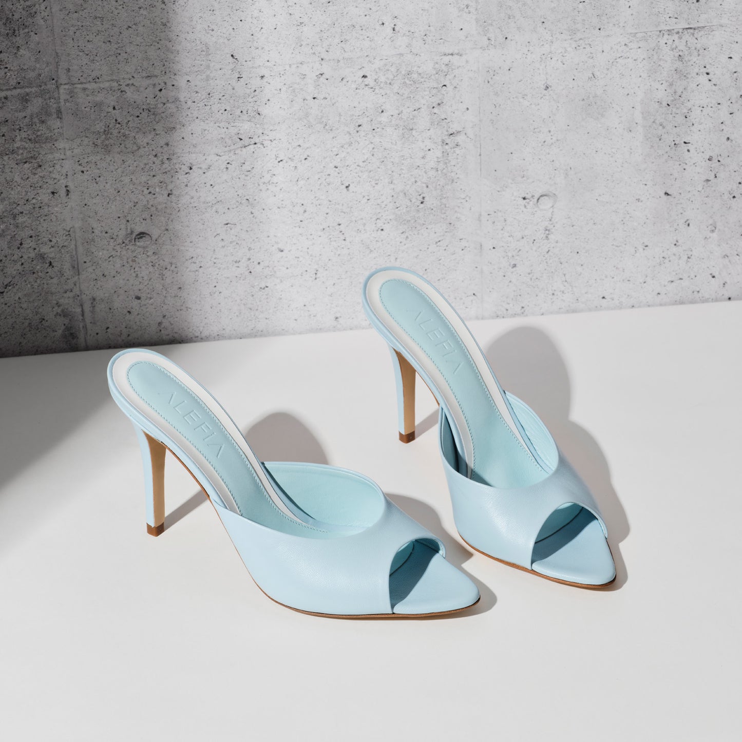 high heel blue mule
blue heels
blue shoes
woman's blue shoes
woman's blue heels
baby blue shoes
blue mules
